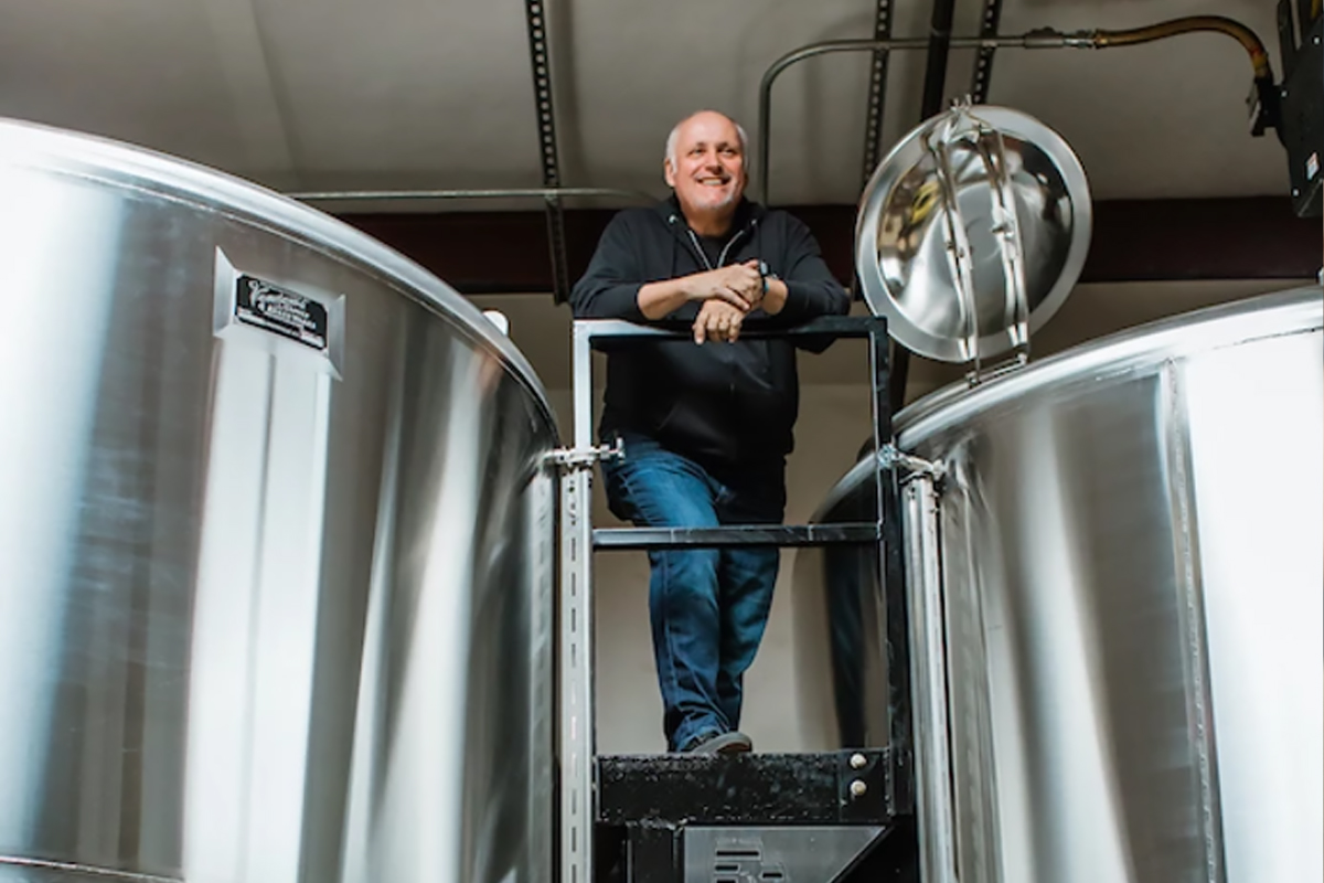 Barrell Craft Spirits: Founder Joe Beatrice poses with the brand’s pair of 6,000 gallon Vendome tanks